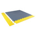 SupraTile PVC Garage Flooring Edges And Corners In Yellow With Dovetail Interlocking PatternShown On A Gray Tile