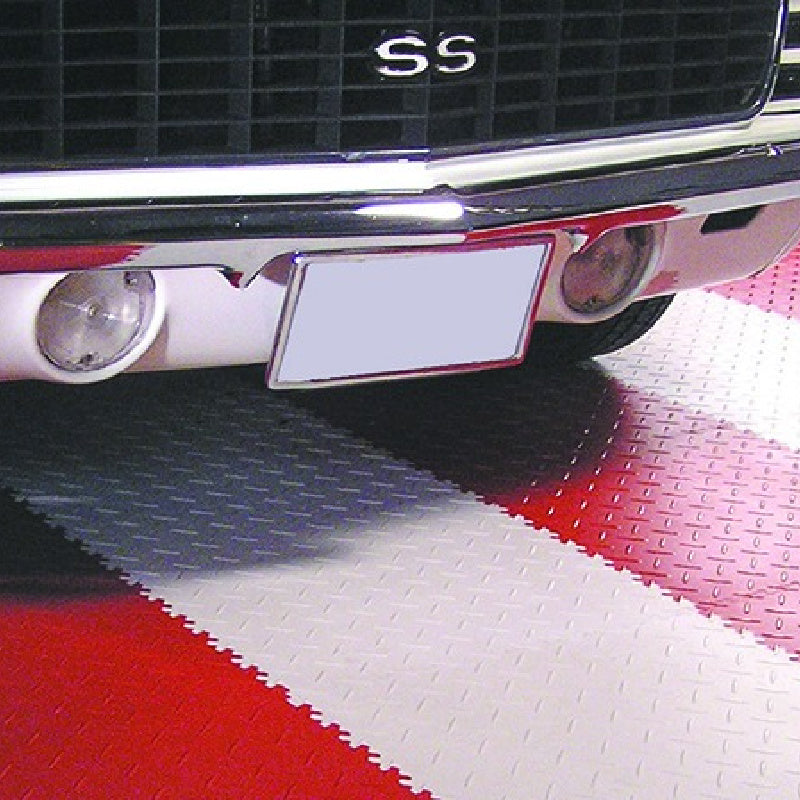 Finished Product Of SupraTile 1 Part Floor Tile Epoxy Showing Red And White Diamond Plate PVC Tiles Under A Nice Car