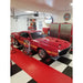 Classic Red Mustang on Black and White Checkered RaceDeck XL Flooring Tiles, Surrounded by Vintage Signs and Cabinets in a Stylish Garage by SnapLock