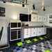 Sleek home garage with RaceDeck FreeFlow tiles in Sublime, Black, and Graphite
