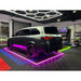 Stylish garage floor with RaceDeck FreeFlow Black tiles and Royal Blue, Sublime, and Red borders